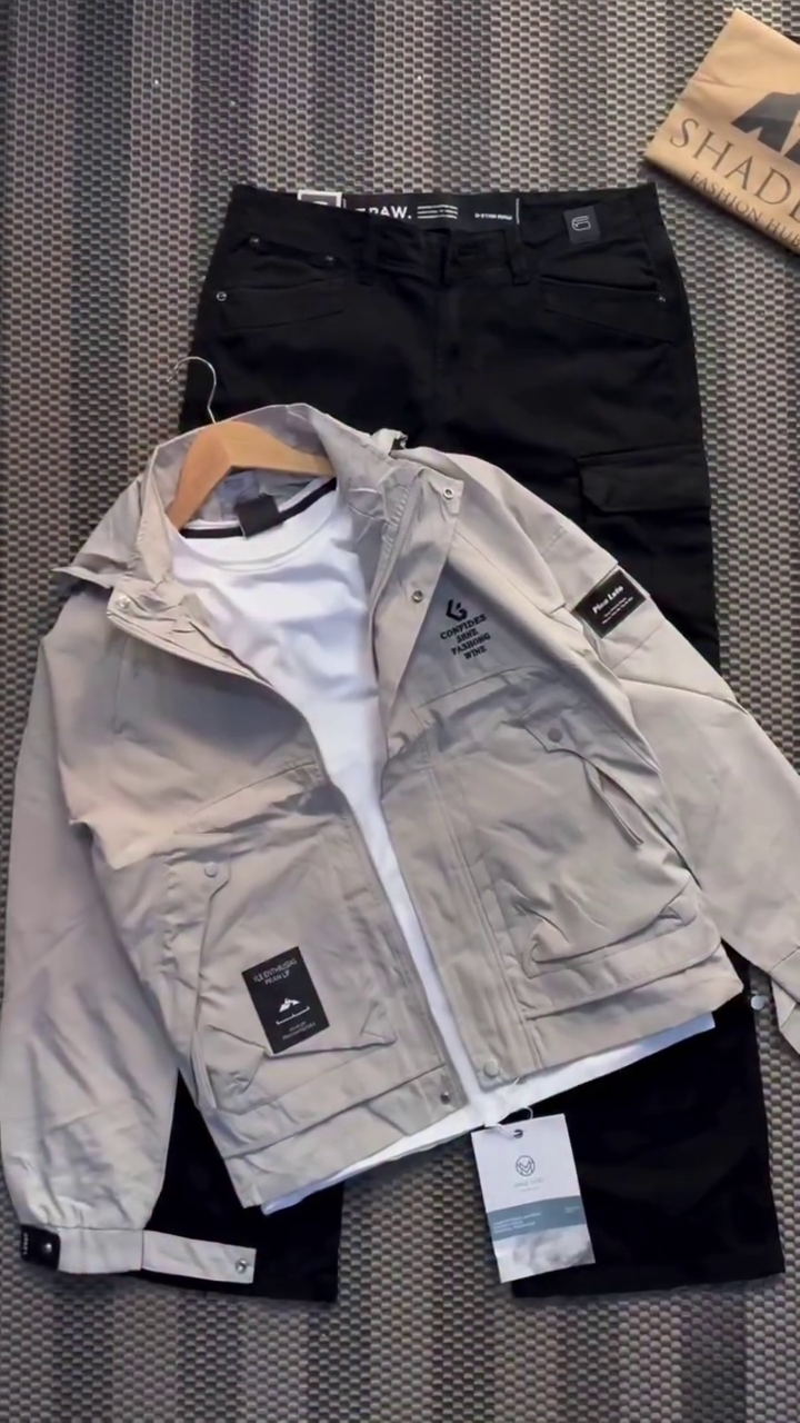 🤍🖤All-Weather Adventure Grey Hooded Utility Jacket with Secure Flap Pockets, Paired Black Tapered Pants & Crisp White T-Shirt – Everyday Smart Casual Combo
