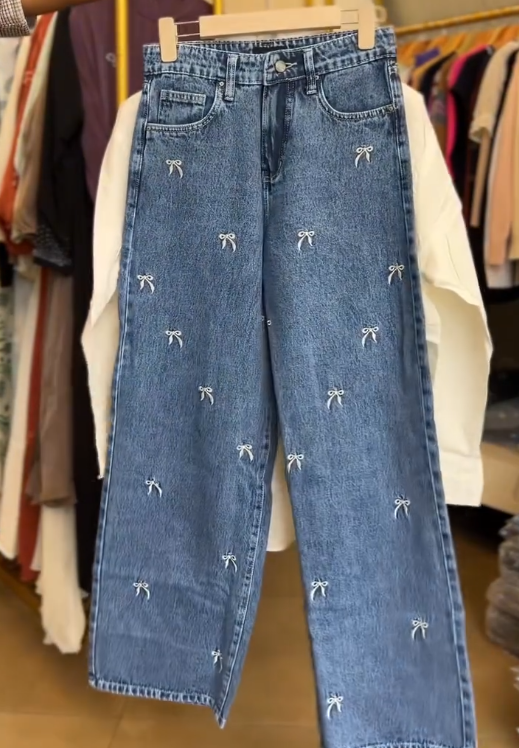 🤍🦋 Fresh & Feminine: White Cotton Shirt with Navy Embroidery Paired with Jeans - Image 5
