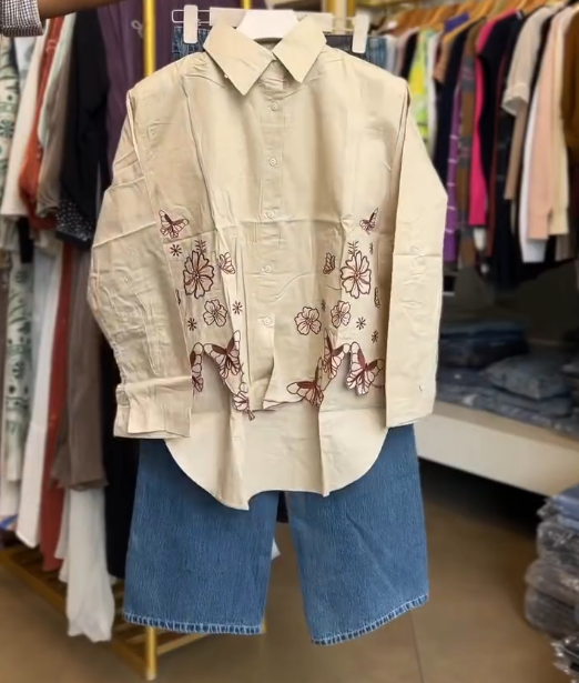 🤍🦋 Fresh & Feminine: White Cotton Shirt with Navy Embroidery Paired with Jeans - Image 4