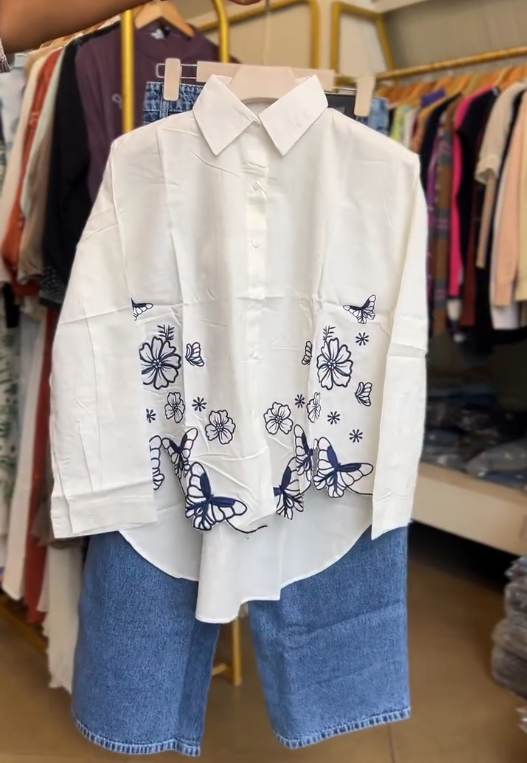 🤍🦋 Fresh & Feminine: White Cotton Shirt with Navy Embroidery Paired with Jeans