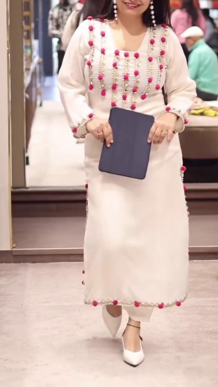 Hand-Embellished Kurta Set with Pink Tassel Detailing – Where Elegance Meets Artistry