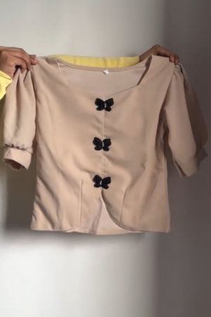 Chic & Playful: Cream Korean-Style Top with Butterfly Embellishments 🦋🤍