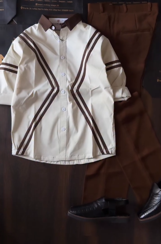 Sharp Contrast Style: White Shirt with Bold Brown V-Striping & Dark Trousers π€π€π